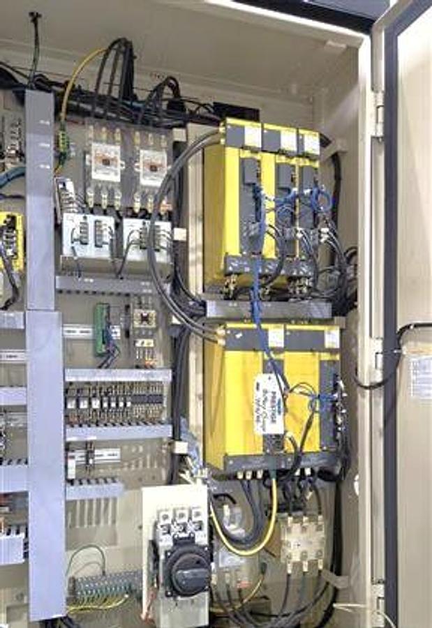 Used 2015 OKK HMC-400 with Full 4th Axis, 60 Station Tool Changer, CAT40, Coolant Thru Spindle, Renishaw OMP60 Probe, Conveyor