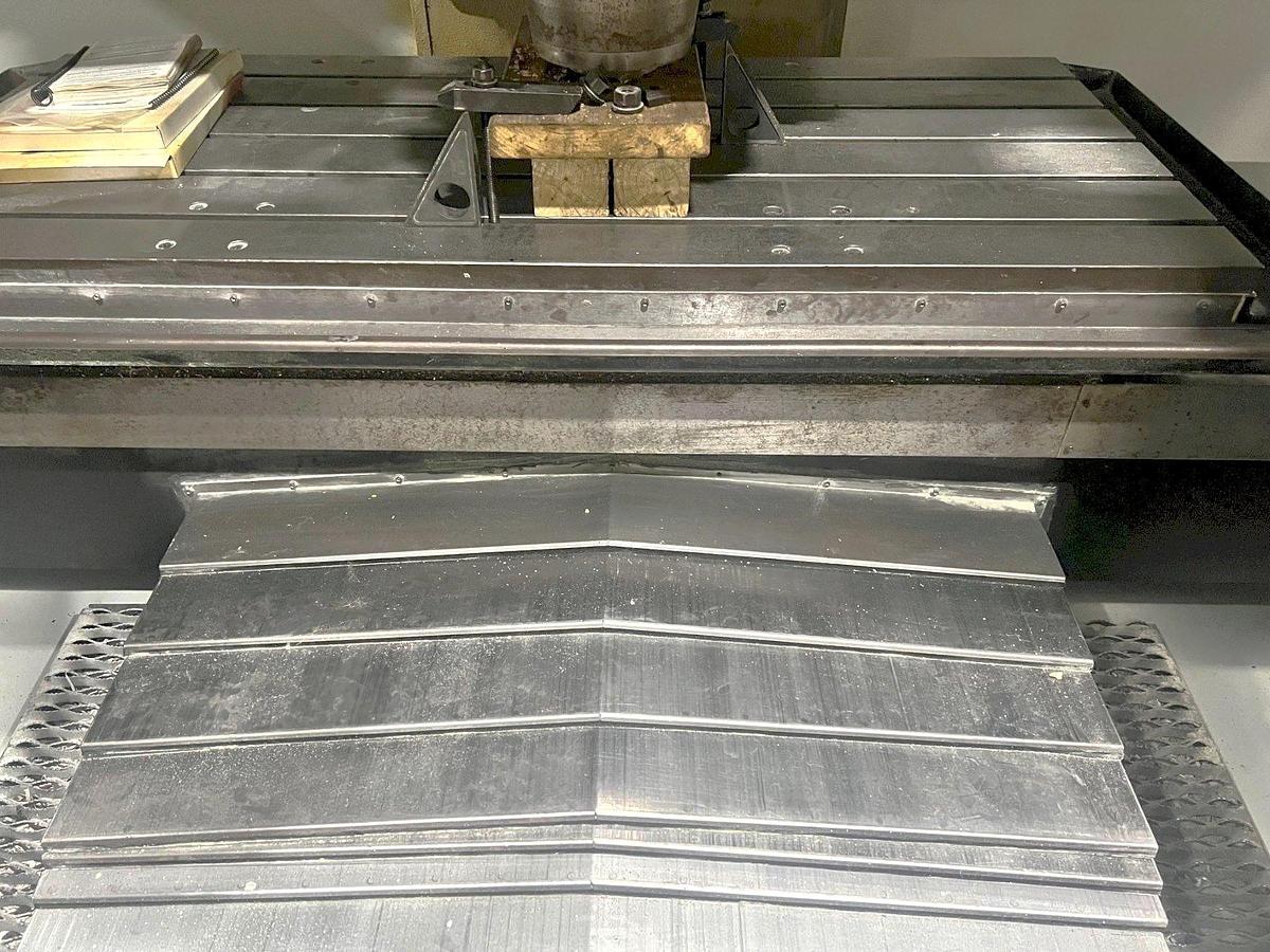 Used 2011 Haas VF-6/50 with CAT 50 Taper Spindle, Programmable Coolant Nozzle, Chip Auger, 2 Speed Gearbox