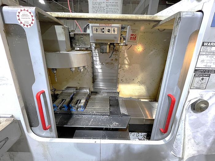 Used 2003 Haas VF2D w/ 15,000 rpm spindle, pcool, chip auger