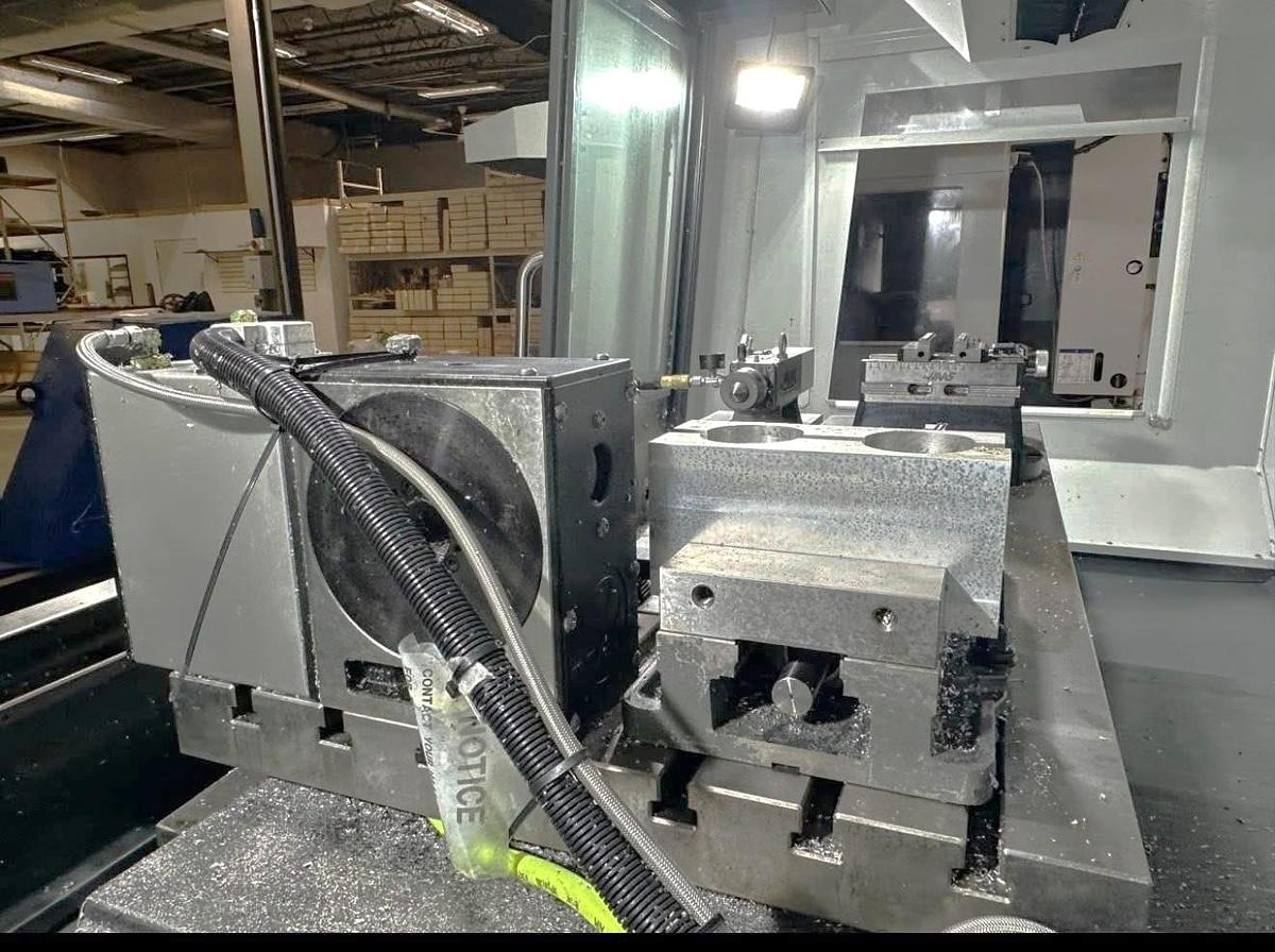 Used 2021 Haas VF-5SS with Haas HRT-160 4th Axis Table, Probing, PCool, Auger, 4th & 5th Axis Drives, Mist Collector, Tooling