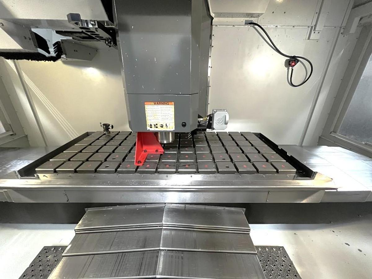 Used 2012 Haas VM-6 with Haas Probing, Coolant Through the Spindle, 4th Axis Drive, Auger, 40 Station ATC, HSM, Boom Crane