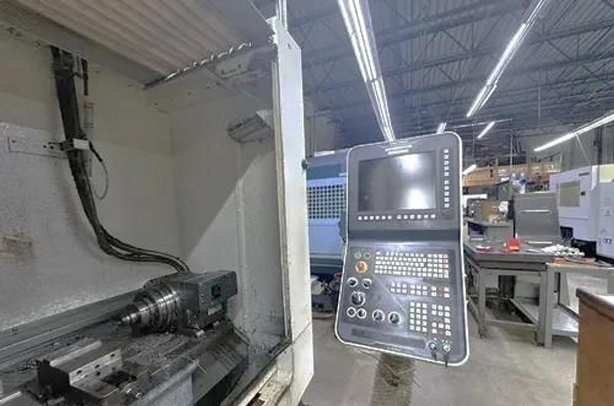 Used 2017 DMG Mori CMX 1100V  with 4th Axis Rotary Table, 12,000 RPM, Chip Conveyor, 30 Station Side Mount ATC