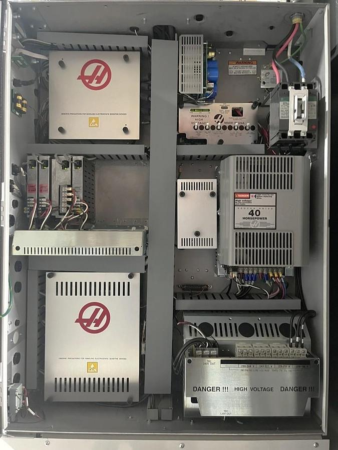 Used 2012 Haas VM-6 with Haas Probing, Coolant Through the Spindle, 4th Axis Drive, Auger, 40 Station ATC, HSM, Boom Crane