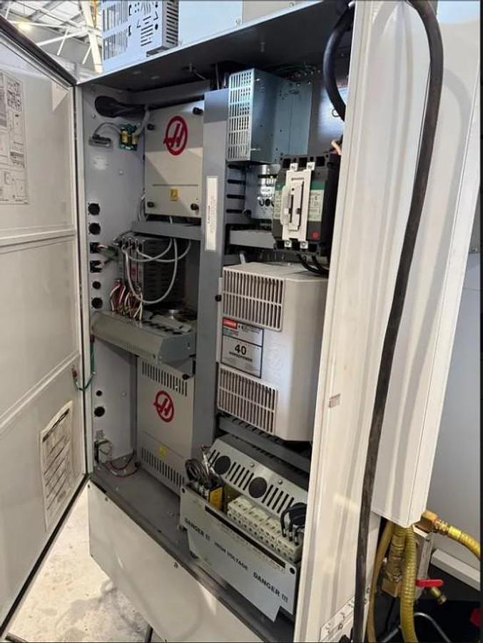 Used 2012 Haas VF2 with 4th Axis Drive/Wiring, Visual Quick Code, Rigid Tapping, USB Port, Low Hours, 20 Pos. Tool Carousel