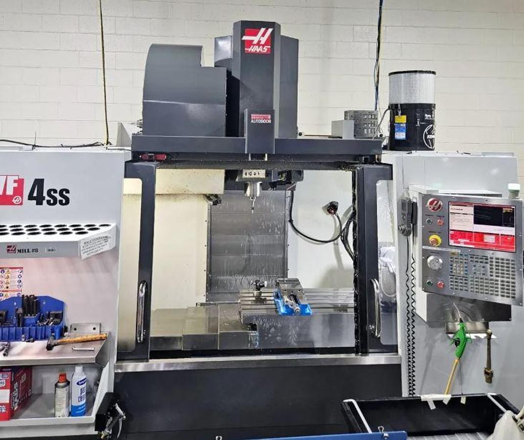 Used 2012 Haas VF4SS with Haas TR-160Y Trunnion Style 4th/5th Axis Table, Probing, 40 ATC, Conveyor