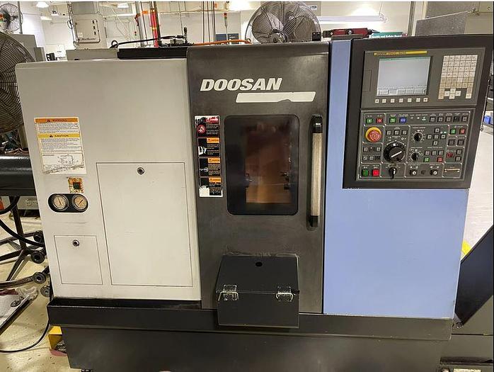 Used 2010 Doosan Lynx 220A with Barfeed