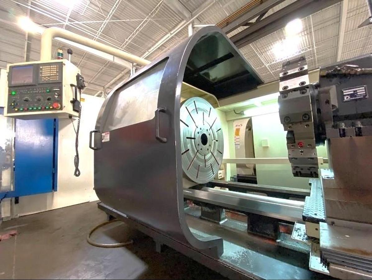 Used 2007 Hwacheon T130 CNC T-Lathe with 51.18" Swing, 35.83" Max Cut Diam., 400 RPM, 6.1" Bore, 50" Chuck, 12 Station Turret, Fanuc