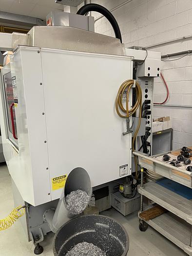 Used 2003 Haas Mini Mill with Chip Auger and Tool Changer
