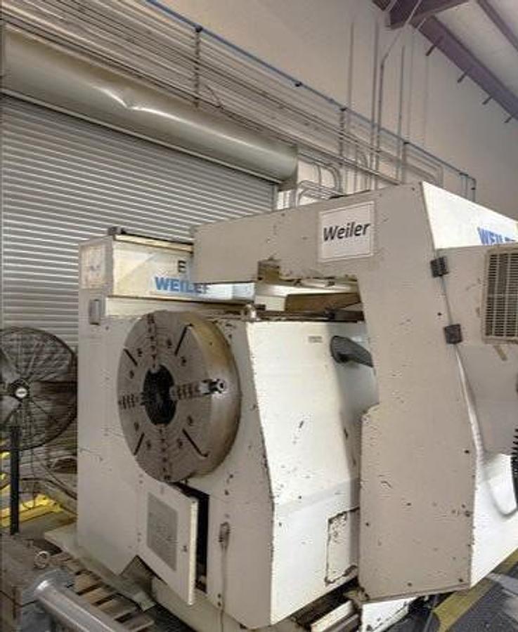 Used 2008 Weiler E90/3000 with 14" Bar Capacity, (2) 31" 4 Jaw Chucks, 120" cc, Chip Conveyor, Tailstock, Steady Rest, Weiler Control