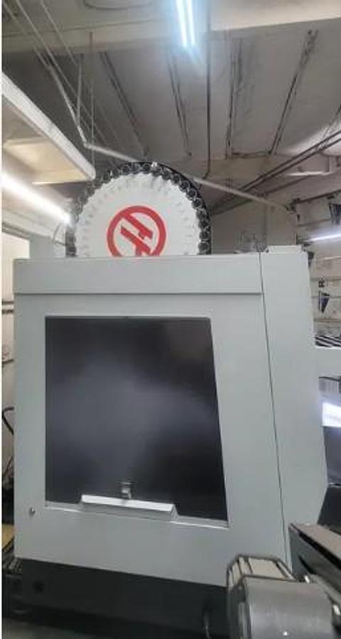 Used 2016 Haas VF4SS with Haas HRC-160 4th Axis Rotary Table, 40 Station ATC, Renishaw Probing, Pcool, 12,000 RPM