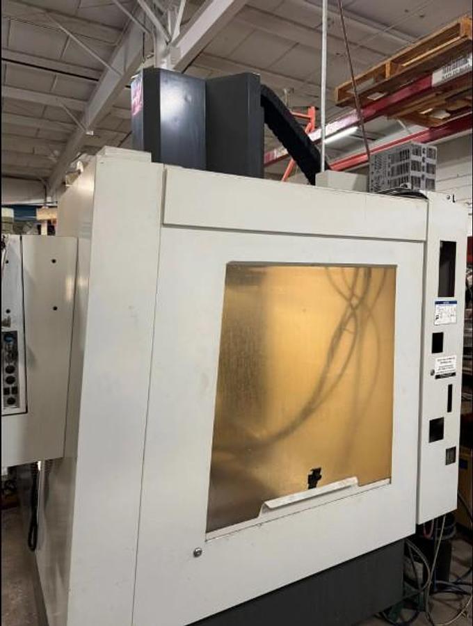 Used 2012 Haas VF-3SS with 4th Axis Rotary Table, Chip Auger, RJH, 24 Station Side Mounted ATC, 12,000 RPM