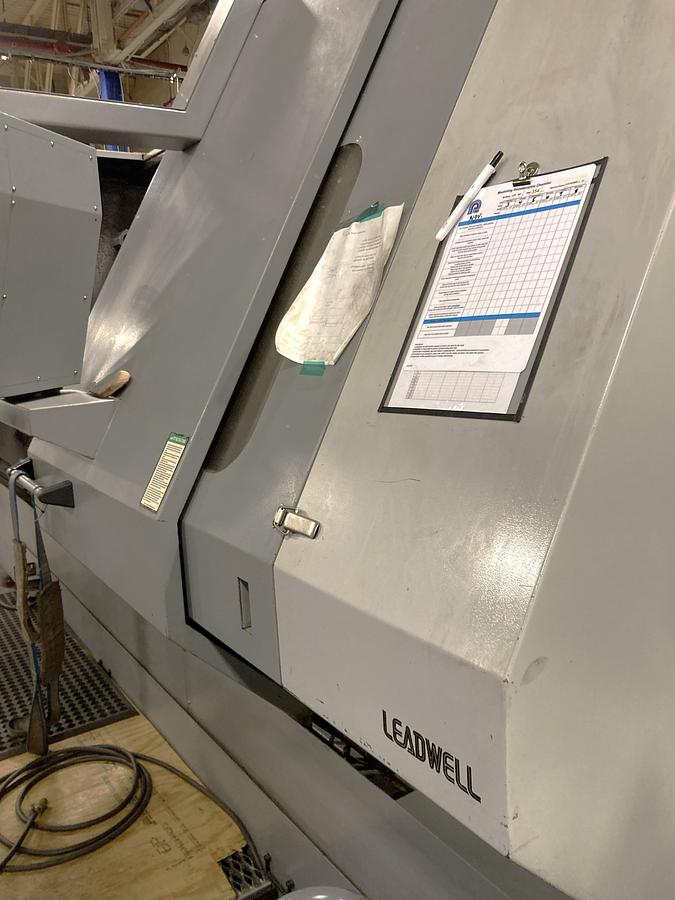 Used 2006 Leadwell LTC50-BL with 18" Hyd Chk, 4.6" Bar Cap., 33.5" sw, 80" cc, 1500 RPM, 50 HP, Steady Rest, Conveyor, Fanuc 0i-TC