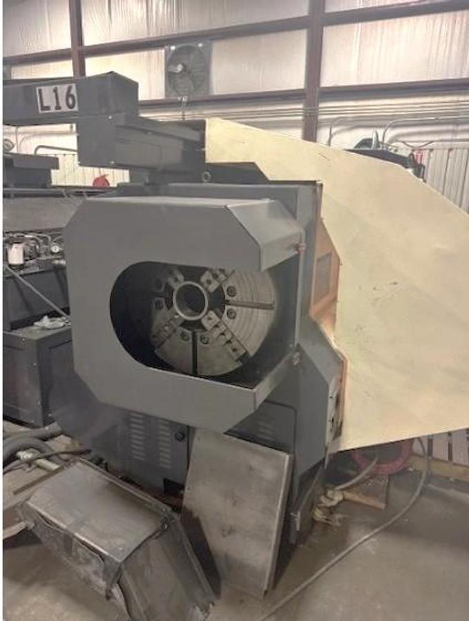 Used 2007 Mazak Powermaster 3000U  w/ 10.2" Bore, (2) 18" 4 Jaw Manual Chucks, Chip Conveyor, Tailstock