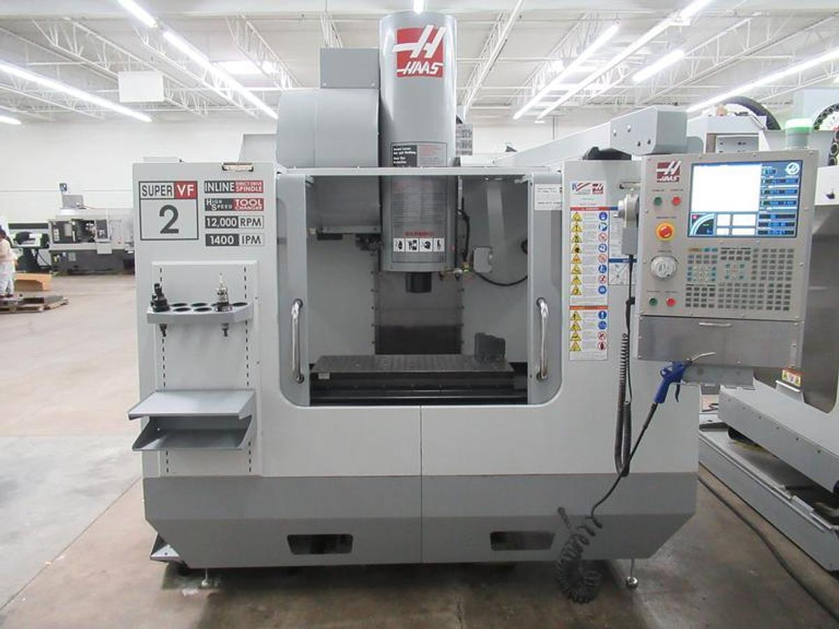 Used 2007 Haas VF2SS with Probing, Chip Auger, Progr. Coolant Nozzle, 24 Station SMATC, Jog Handle, Stevens Fixture Plate