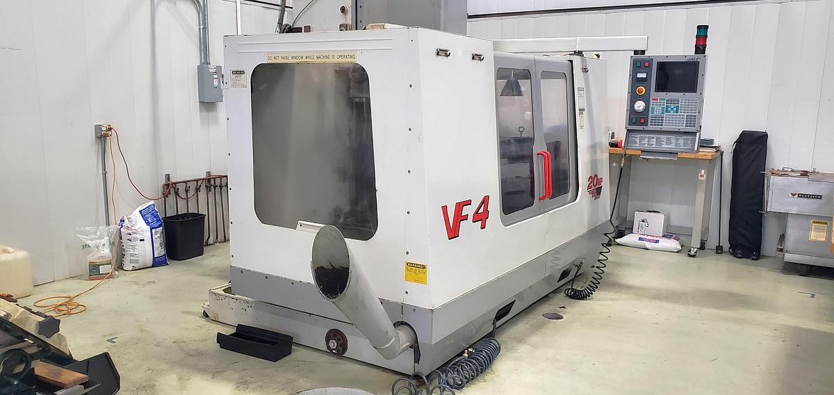 Used 2001 Haas VF4D with Haas HRT210 4th Axis Table, Tailstock, Auger, Prog. Coolant, Quick Code