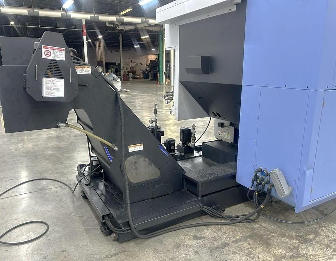 Used 2022 DN Solutions DVF 6500 5 Axis Trunnion VMC with 18,000 RPM, 60 ATC, Coolant Thru Spindle, Probing, Chip Conveyor
