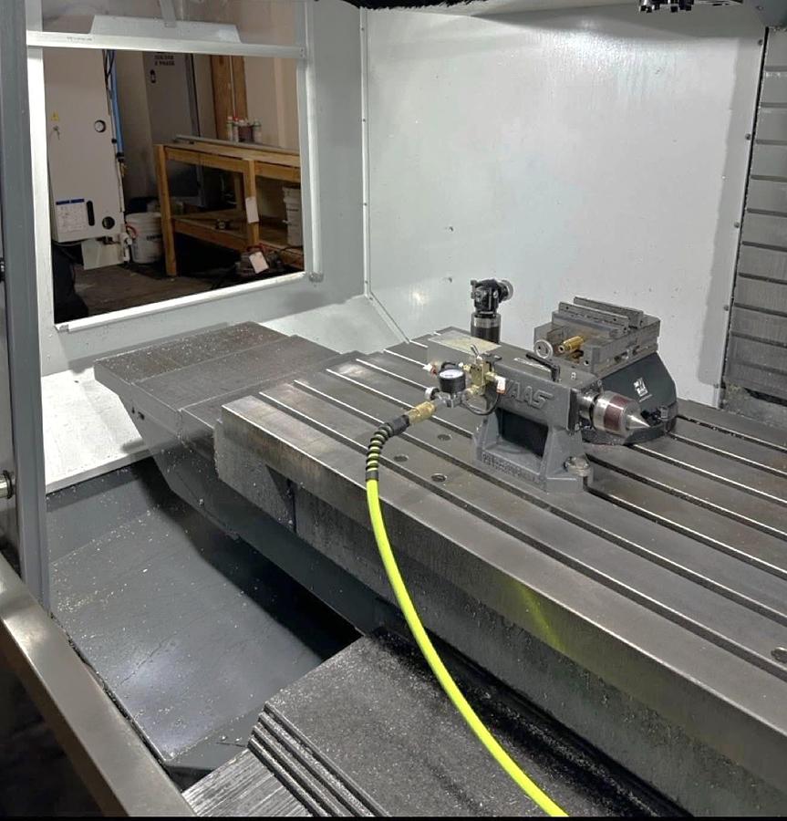 Used 2021 Haas VF-5SS with Haas HRT-160 4th Axis Table, Probing, PCool, Auger, 4th & 5th Axis Drives, Mist Collector, Tooling