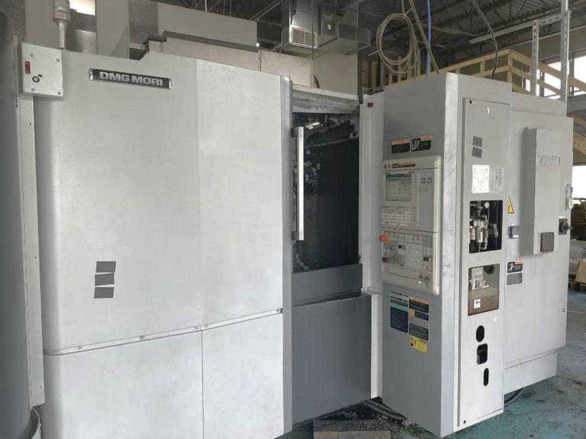 Used 2014 DMG Mori NHX 4000 with 5 Pallet Pool, Full 4th Axis Table, Tool Probe, 1000 PSI Cool Thru Spindle, 120 Station ATC, Conveyor