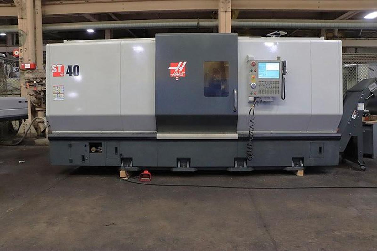 Used 2012 Haas ST-40 Chucker with 15" Hydr. Chuck, Tool Presetter, Chip Conveyor, 4" Bar Capacity, Some Tool Holders (no tailstock)