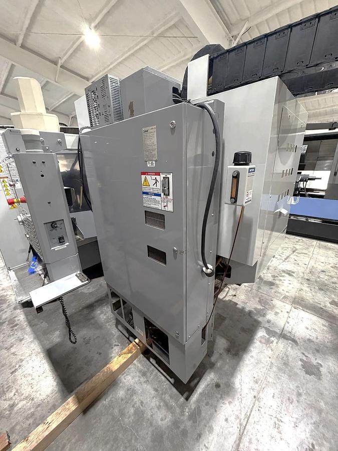 Used 2009 Haas ES-5-4T with HRT 4th Axis Rotary Table, Tool Probing, Remote Jog Handle, Chip Auger