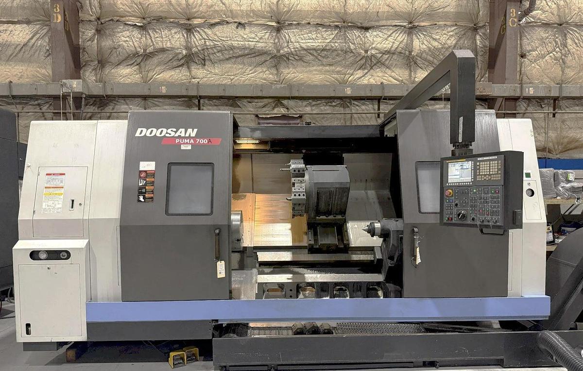 Used 2013 Doosan Puma 700A with 18" Hyd. Chuck, 6.5" Bar Capacity, 63" cc, Tailstock, Chip Conveyor, Tool Presetter, Fanuc 32i Cntrl