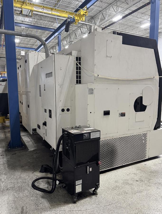 Used 2022 DMG Mori SL603BMC/4000 with C Axis/Live Milling, 28" 3 Jaw Chk, 21" Rear Chk, Steady Rests, 7.3" Bar Cap., Fanuc