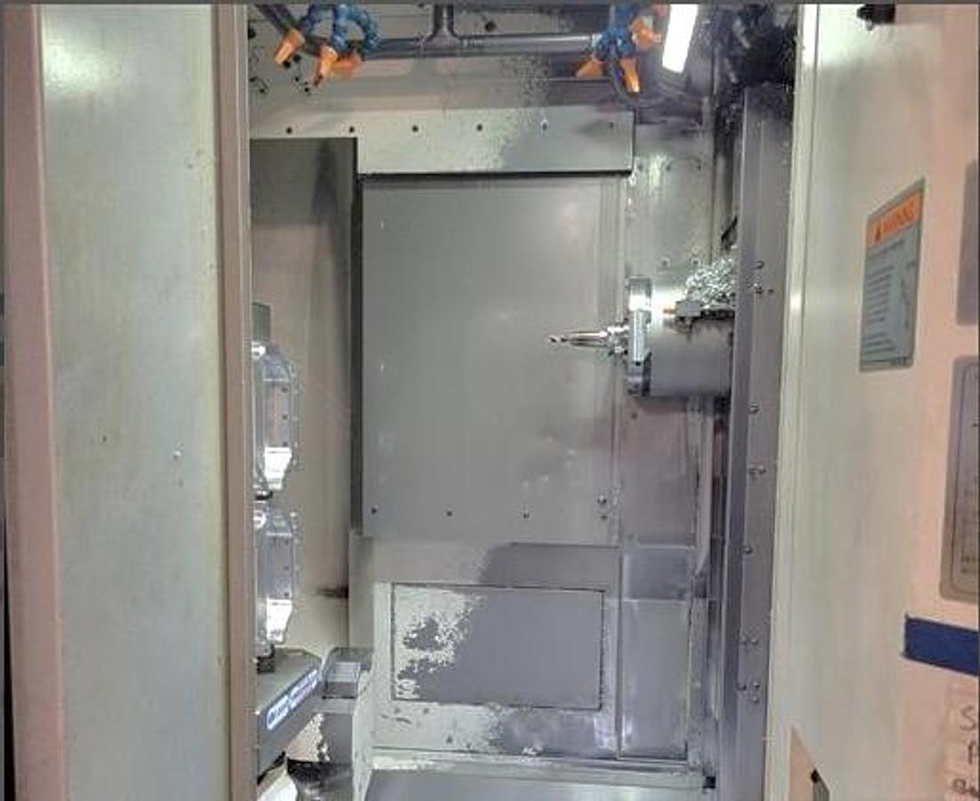 Used 2017 Okuma MB-4000H with 6 Station Rotary Pallet Changer, Full 4th Axis Rotary Tbl, 15k RPM, HSK63 Tpr., HPC, Probing, 64 Pos ATC