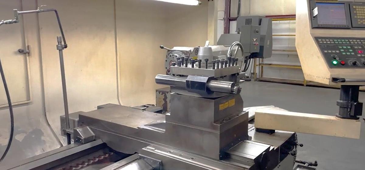 Used 2008 Hankook Protec 11NA with 43" sw, 29" Turn Diam, 78" cc, 4 Tool Manual Turret, Tailstock, Fanuc 21iTB Control, Conveyor