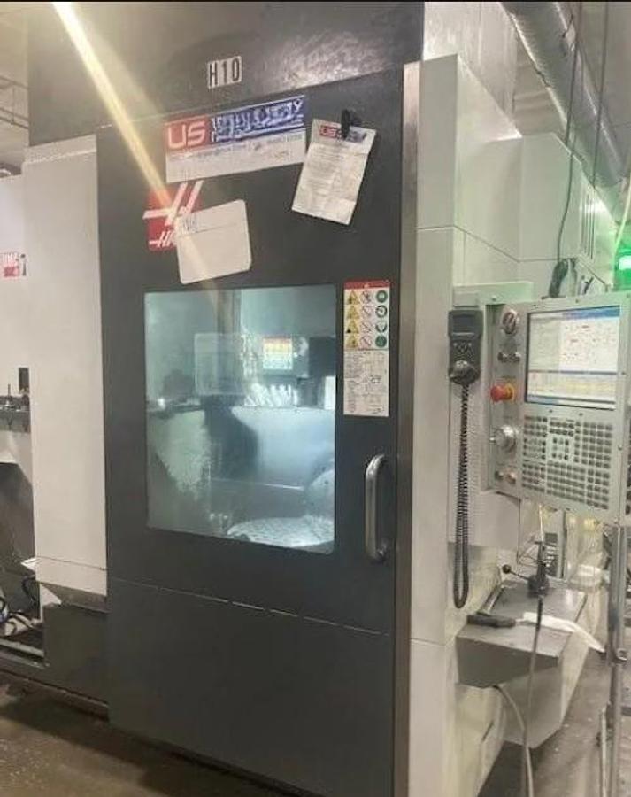 Used 2018 Haas UMC-750 5 Axis Universal Machining Center, 40 ATC, Probing, 1000 PSI CTS, Conveyor