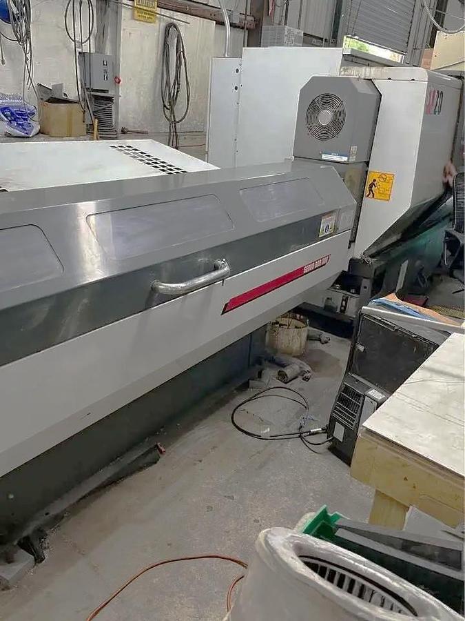 Used 2011 Haas ST-20 with Tailstock, Haas Servo 300 Barfeeder, Chip Conveyor, Tool Presetter, Collet Chuck, Mist Buster
