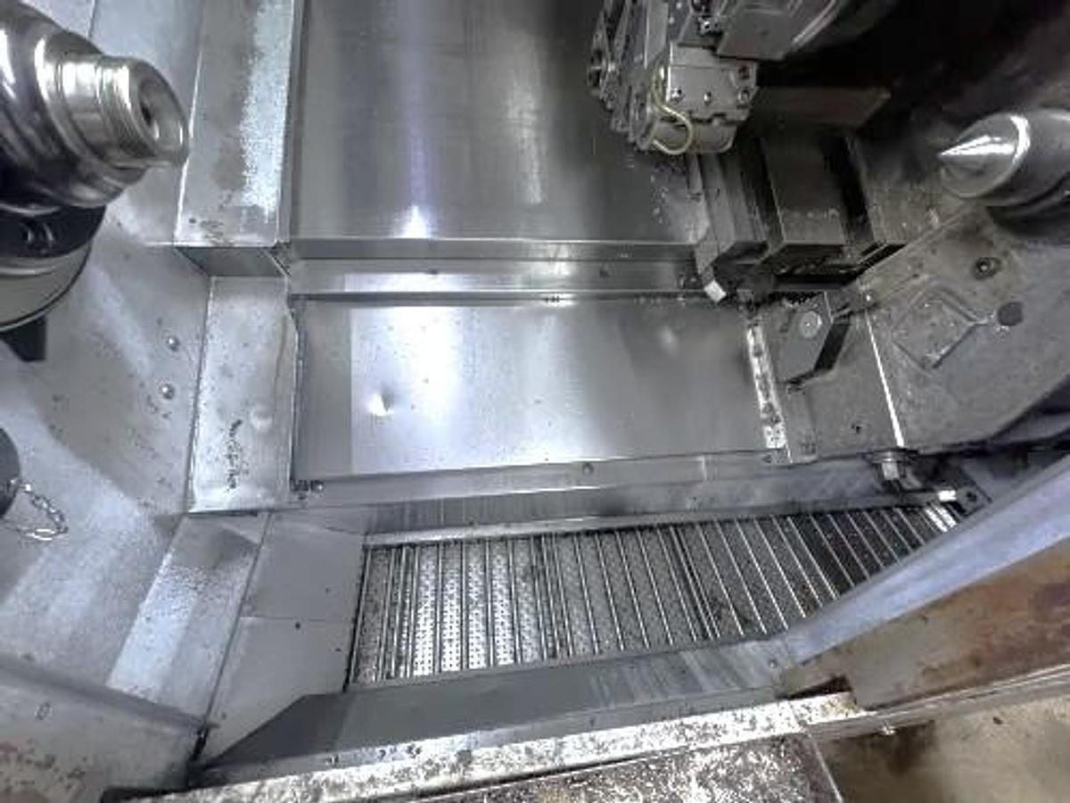 Used 2004 Mori Seiki SL-204MC with C Axis Rotation, Mill/Drilling Capability, Tailstock, Collet Chuck, Chip Conveyor, 2" Bar Capacity