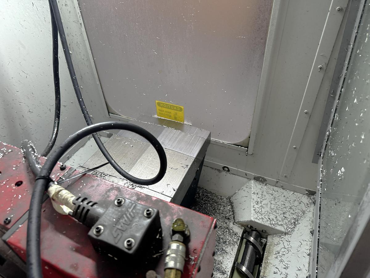 Used 2002 Haas VF2D with Haas Rotary Table, 24 Station Side Mount ATC, Chip Auger, Programmable Coolant