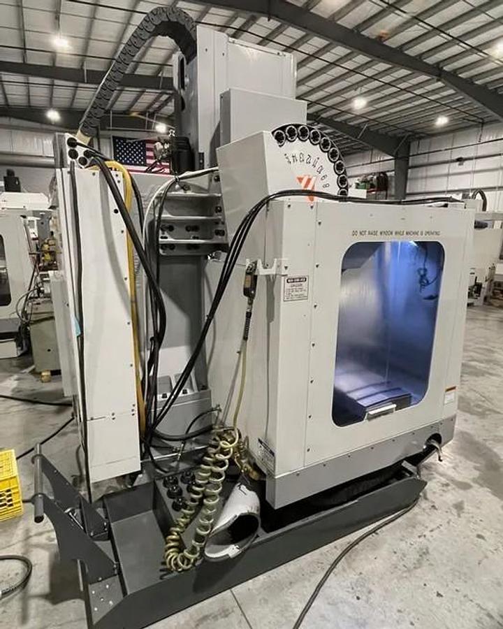 Used 2006 Haas VM-2 with Haas HRT210 4th Axis Table, Prog. Coolant, Remote Jog Handle, 24 Station Side Mount ATC, High Spd Machining