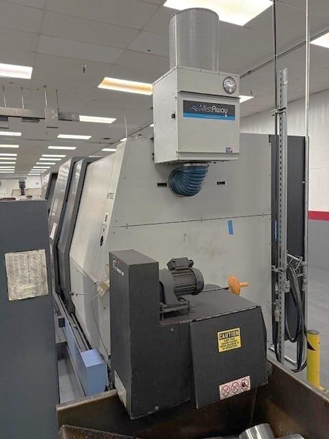 Used 2012 Doosan Puma 700L with 24" Hyd. Chk, 6.5" Bar Cap., 126" Turn Length, SMW Steady Rest, Tailstock, Conveyor, Tool Eye