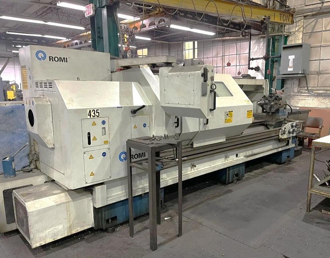 Used 2002 Romi M27 x 120" with 4" Bar Capacity, Tailstock, 15" Chuck, 8 Station Turret, Chip Conveyor