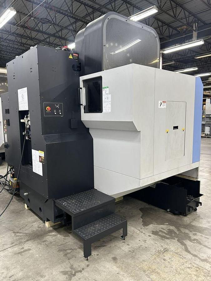 Used 2022 DN Solutions Mynx 5400/50 II with 4th Axis Drive, CAT50 Big Plus Spindle, Chip Conveyor, Mist Collector, Conversational