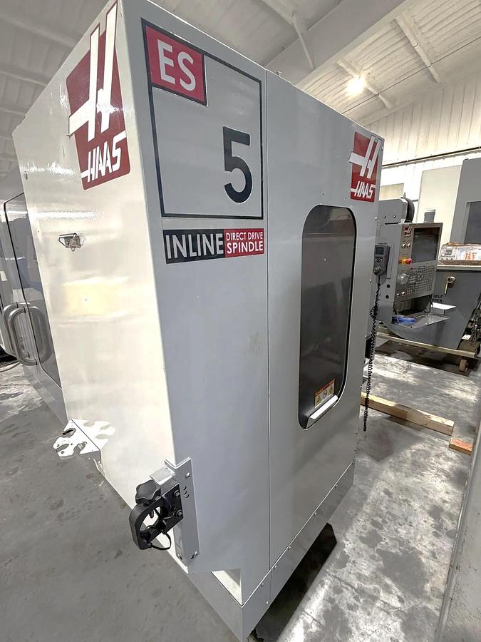 Used 2009 Haas ES-5-4T with HRT 4th Axis Rotary Table, Tool Probing, Remote Jog Handle, Chip Auger
