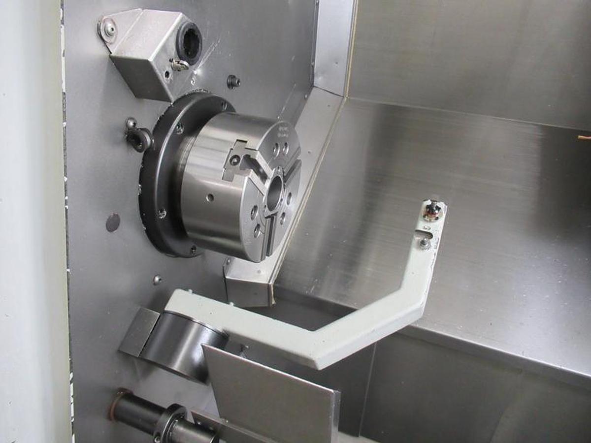 Used 2008 Haas SL-20T with Tailstock, 8" Hyd Chuck, Tool Presetter, Parts Catcher, Chip Auger, 2" Bar Cap., Cold Fire II Processor