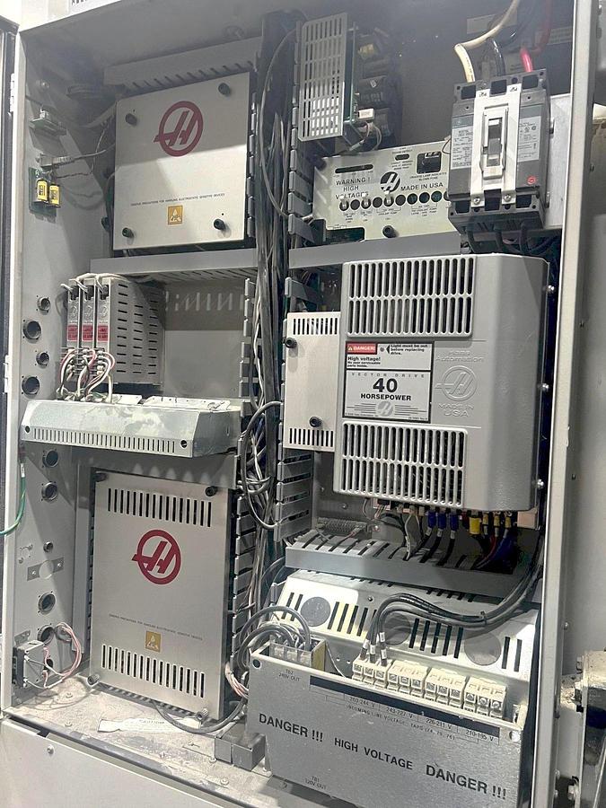 Used 2011 Haas VF-6/50 with CAT 50 Taper Spindle, Programmable Coolant Nozzle, Chip Auger, 2 Speed Gearbox