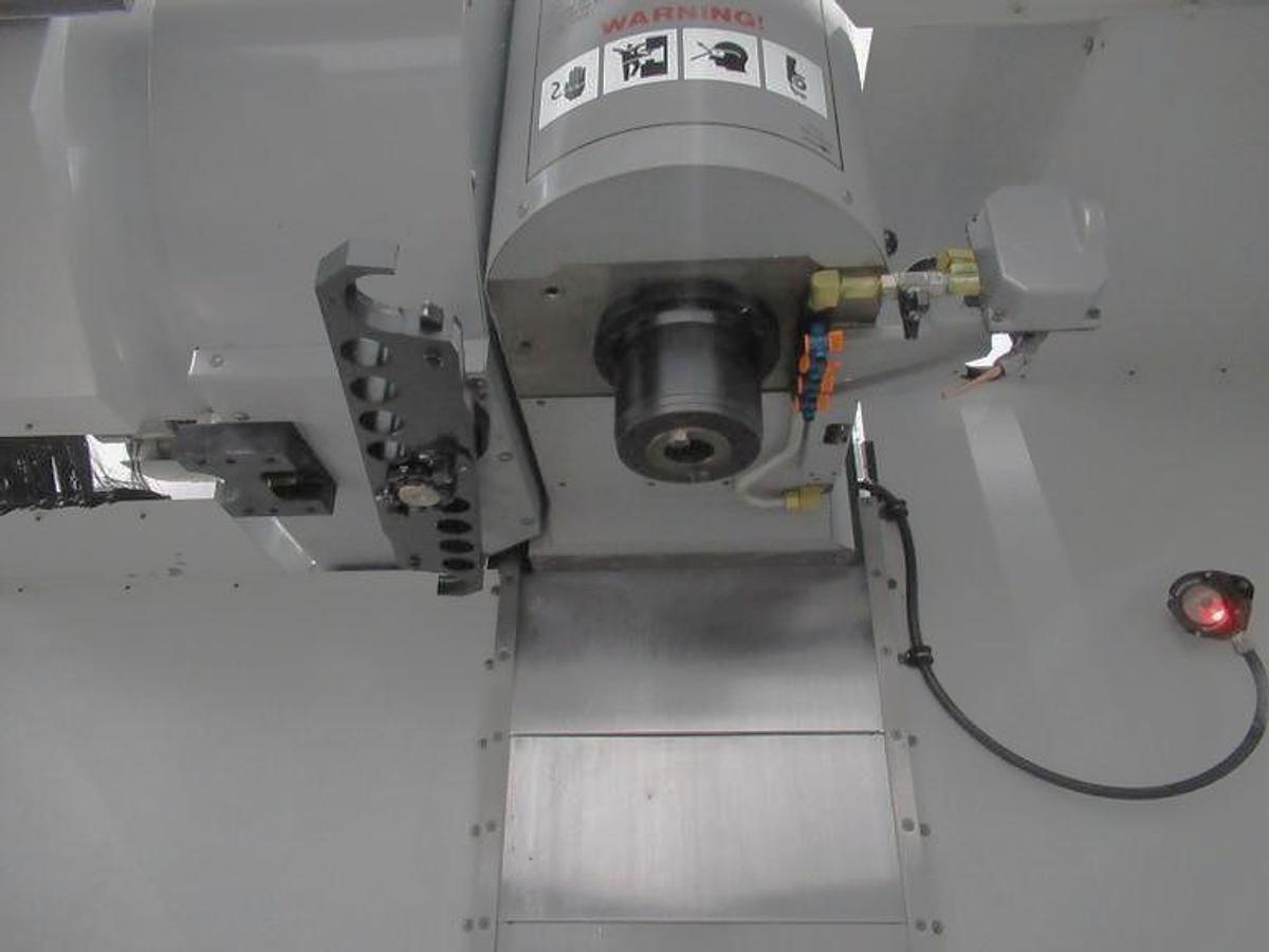 Used 2007 Haas VF2SS with Probing, Chip Auger, Progr. Coolant Nozzle, 24 Station SMATC, Jog Handle, Stevens Fixture Plate