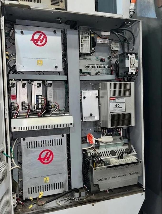 Used 2014 Haas VF-12/50 with 30 Pos. Side Mounted ATC, Wired for 4th Axis, High Pressure Coolant Thru Spindle