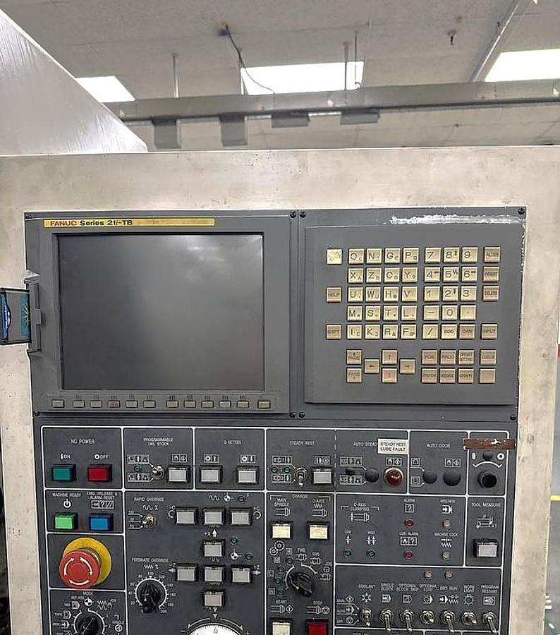 Used 2006 Doosan Puma 700LM with C Axis & Milling, 32" 4 Jaw Man. Chk, 6.5" Bar Cap., 126" Turn Length, SMW Steady Rest, Tailstock, Conveyor