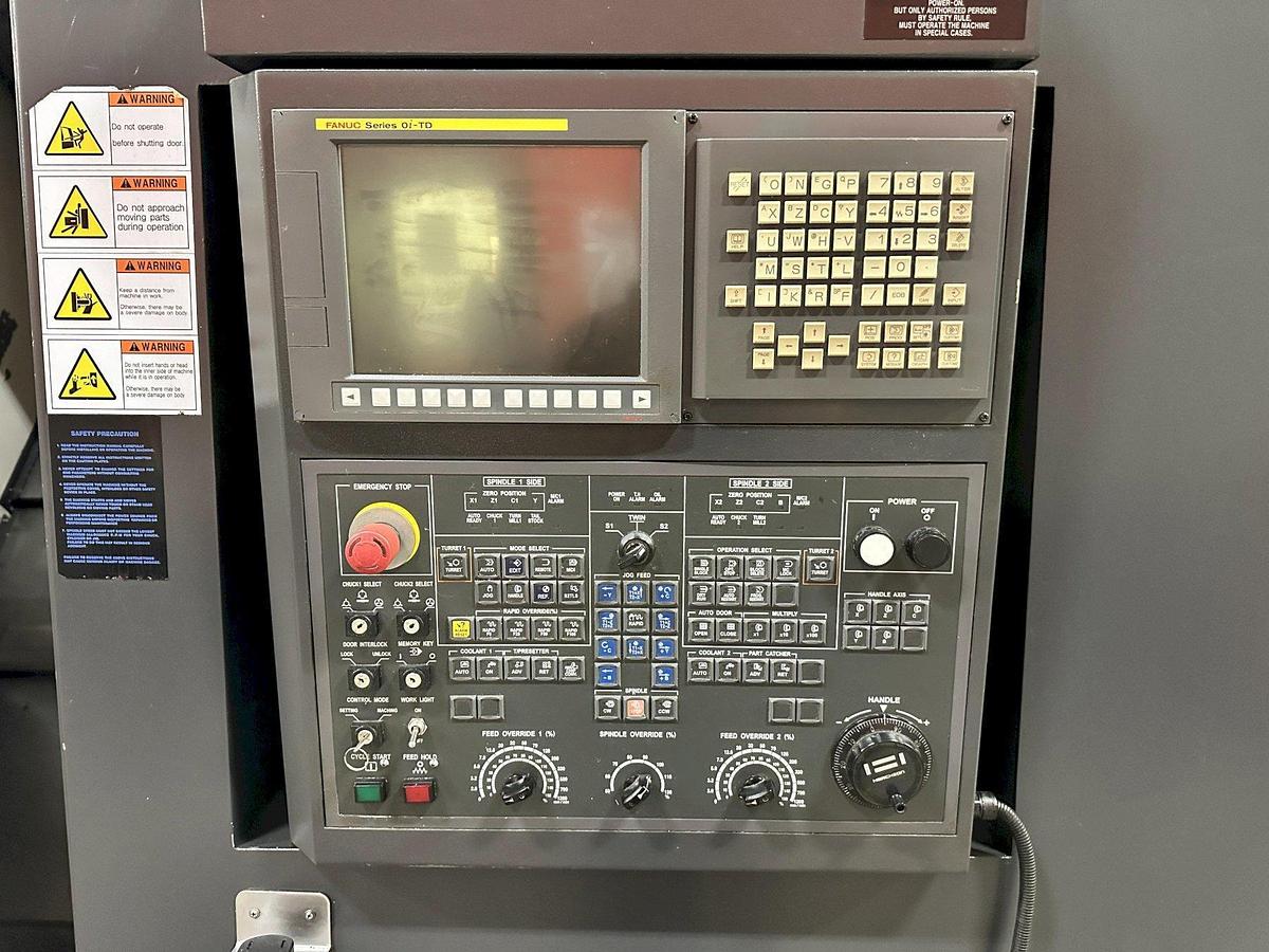 Used 2013 Hwacheon T2-2T with Twin Spindle, Twing Turrets, Live Milling/Drilling, Parts Catcher & Conveyor, Chip Conveyor, Fanuc 0i-TD