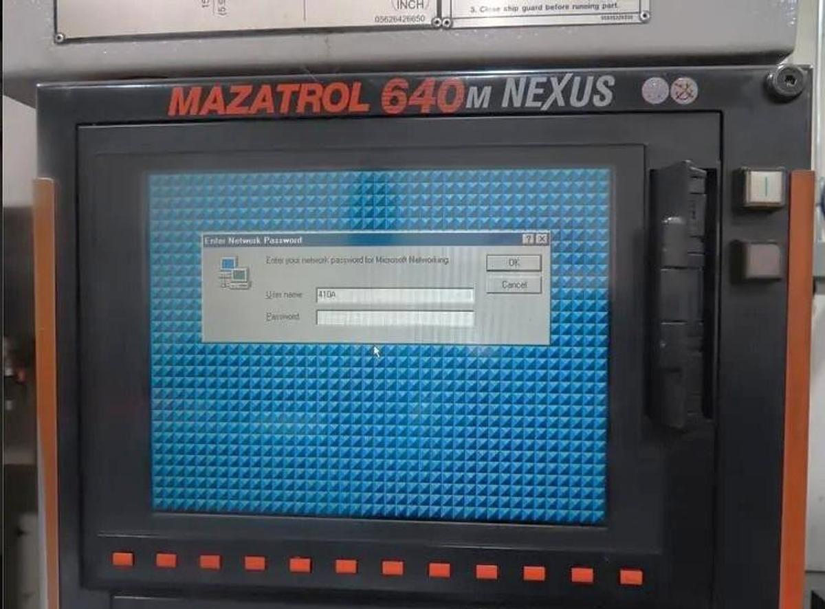 Used 2005 Mazak Nexus VCN-410A with Coolant Thru Spindle, Chip Conveyor, 30 Station Side Mounted ATC, 12,000 RPM