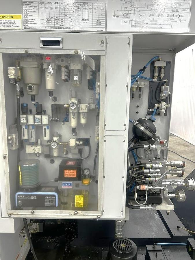 Used 2022 DN Solutions DVF 6500 5 Axis Trunnion VMC with 18,000 RPM, 60 ATC, Coolant Thru Spindle, Probing, Chip Conveyor