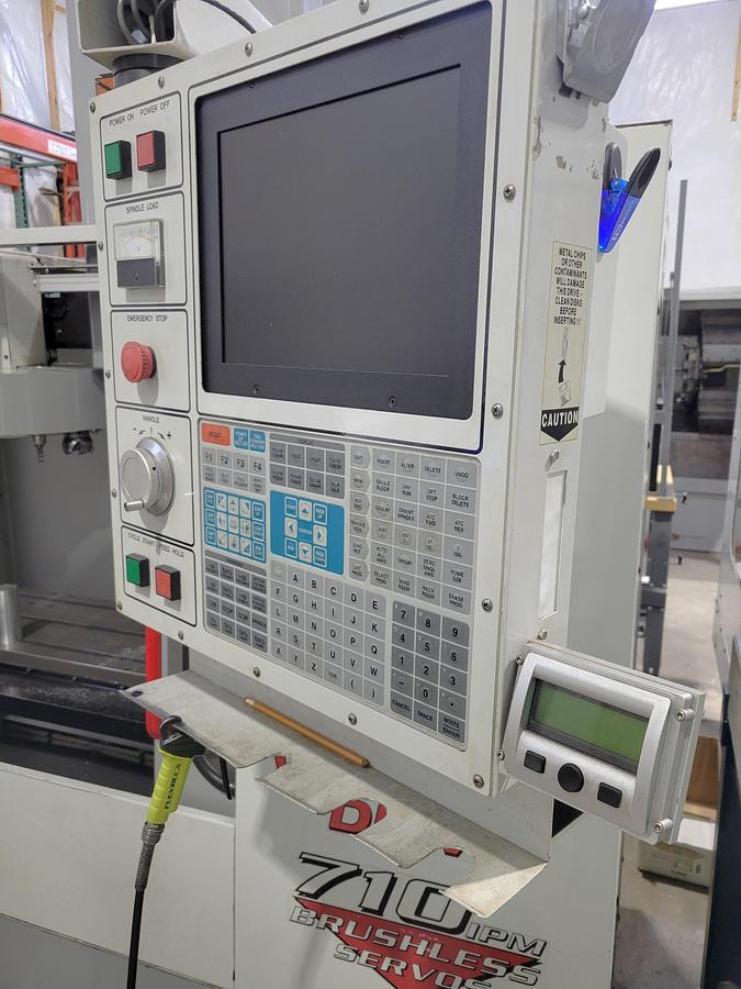 Used 2000 Haas VF2 with Haas 4th Axis Rotary Table, Chip Auger, Programmable Coolant 