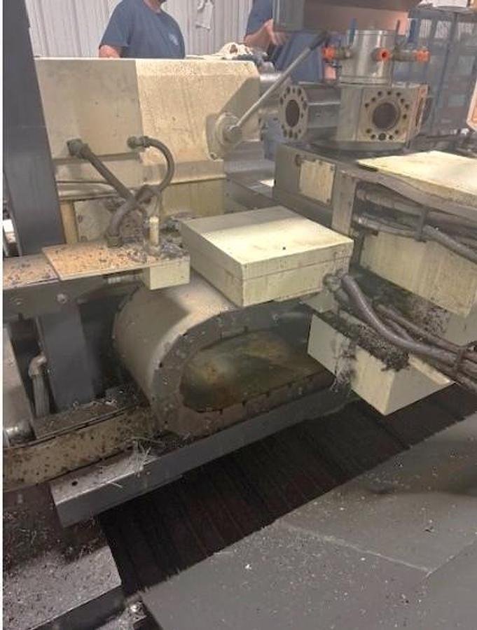 Used 2007 Mazak Powermaster 3000U  w/ 10.2" Bore, (2) 18" 4 Jaw Manual Chucks, Chip Conveyor, Tailstock