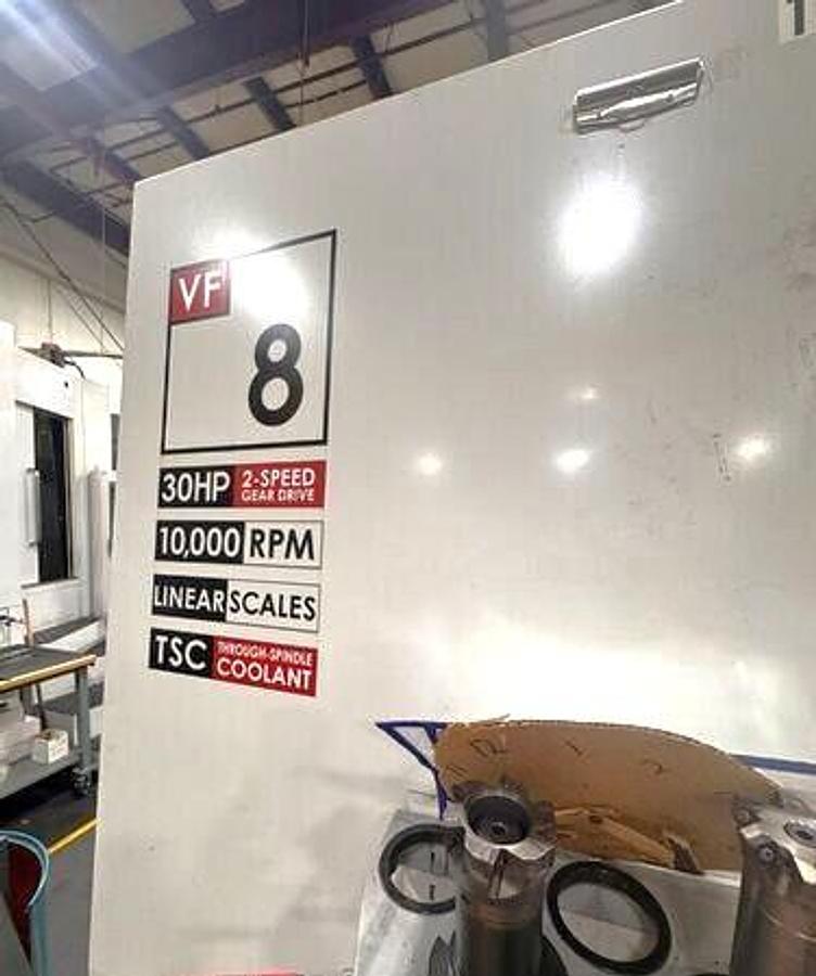 Used 2004 Haas VF8/50 with 50 Taper Spindle, 10,000 RPM Geared Head, Coolant Thru Spindle, Probe Ready, PCool, Auger, Side Mounted ATC