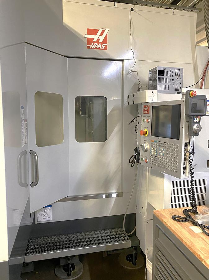 Used 2022 Haas EC-1600ZT-5AX with Ext. Z travel, 4th Axis Table, 50 ATC, CAT 50, TSC, Renishaw Probing, ONLY 140 FEED CUT HOURS