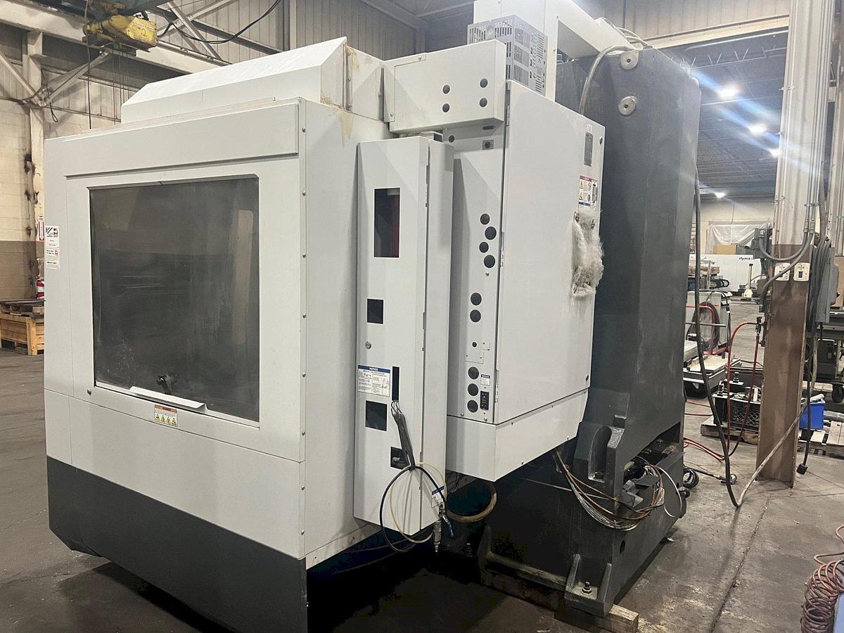 Used 2011 Haas VF-6/50 with CAT 50 Taper Spindle, Programmable Coolant Nozzle, Chip Auger, 2 Speed Gearbox